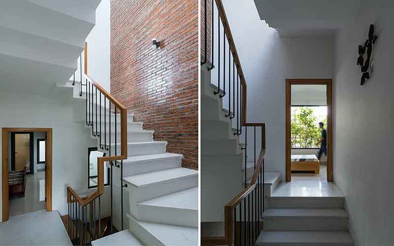 Cầu thang đặt ở hông nhà với giếng trời cung cấp nguồn ánh sáng tự nhiên